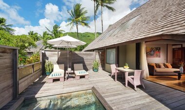 Enjoy the deck and pool at your Garden Pool Bungalow at the Hilton Moorea Lagoon Resort & Spa