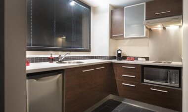 Kitchen inside rooms at Te Moana Tahiti Resort.